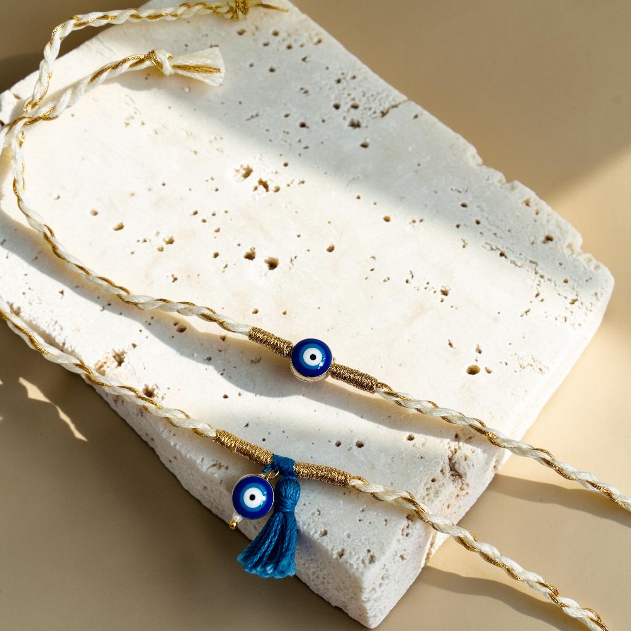 Celestial Evil Eye Rakhi on a festive background