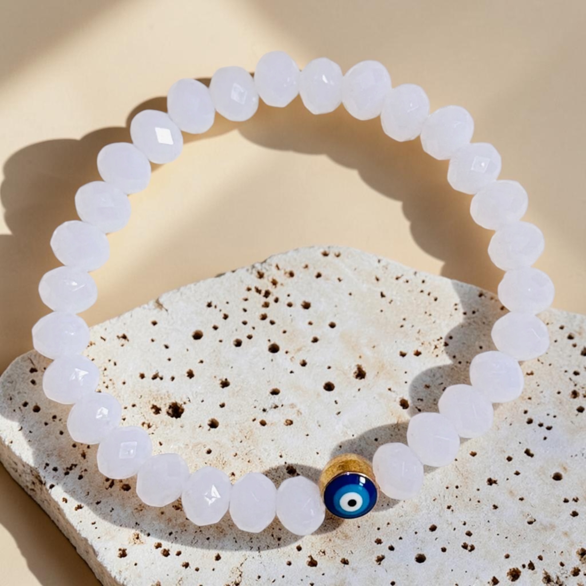 Serene Beaded Bracelet WHITE on a festive background